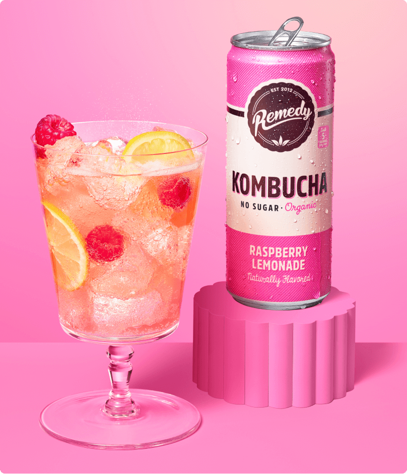 Remedy Kombucha Raspberry Lemonade Can and Glass