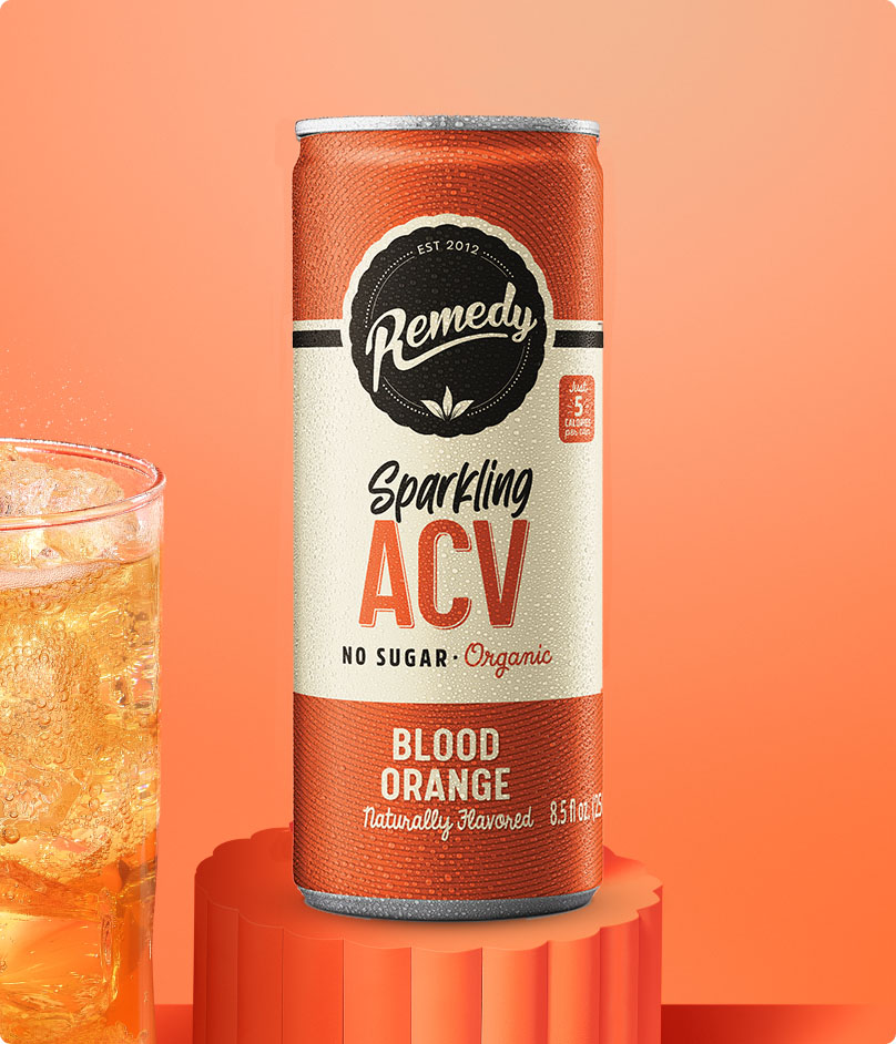 Remedy Sparkling ACV Blood Orange Can and Glass